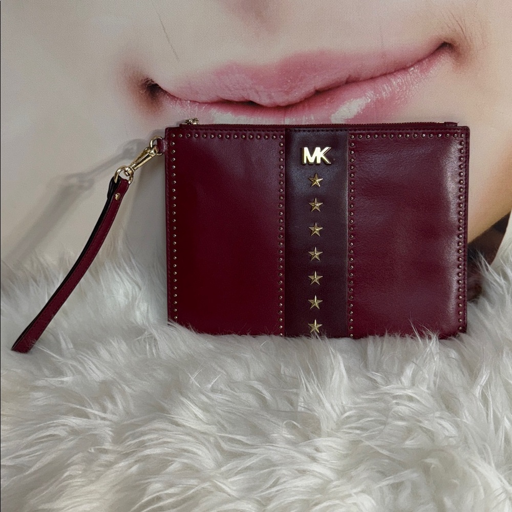 Michael Kors Dark Red Wristlet with Gold Stars and Studs